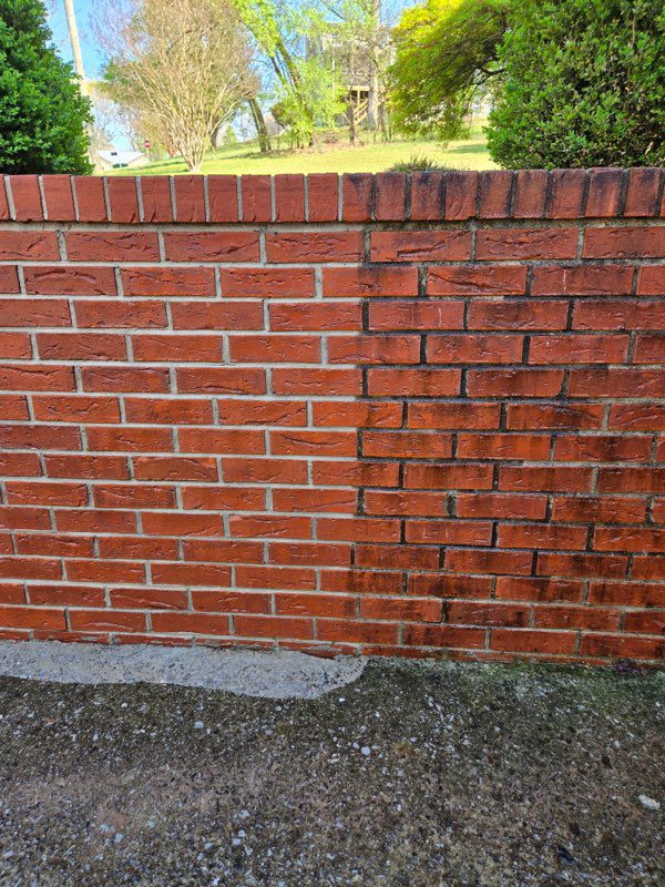 681d234dd9dd5_787498827 A brick wall with a brown stain on it