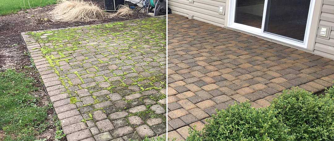 681d33284e4c0_Paver Pressure Wash Comparison A before and after picture of a patio with moss growing on it.